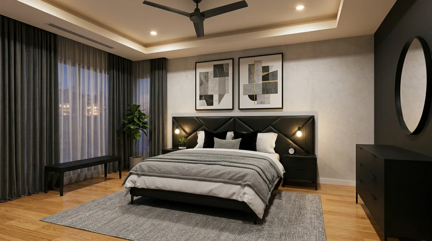 Curved black headboard in a modern bedroom with elegant focal styling.